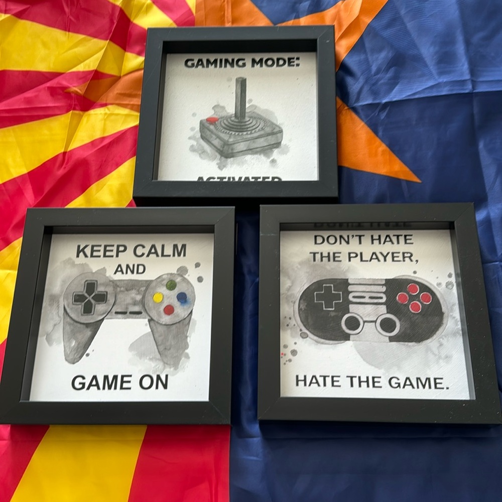 Set of three framing gaming prints